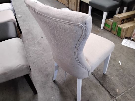 2 DESIGNER CREAM FABRIC CHAIRS WITH WHITE LEGS