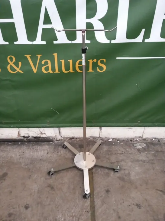 4 ASSORTED STAINLESS STEEL WHEELED DRIP STAND