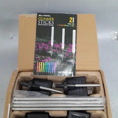 BOXED BELL & HOWELL GLIMMER STICKS SET OF 4 SOLAR PATHWAY LIGHTS