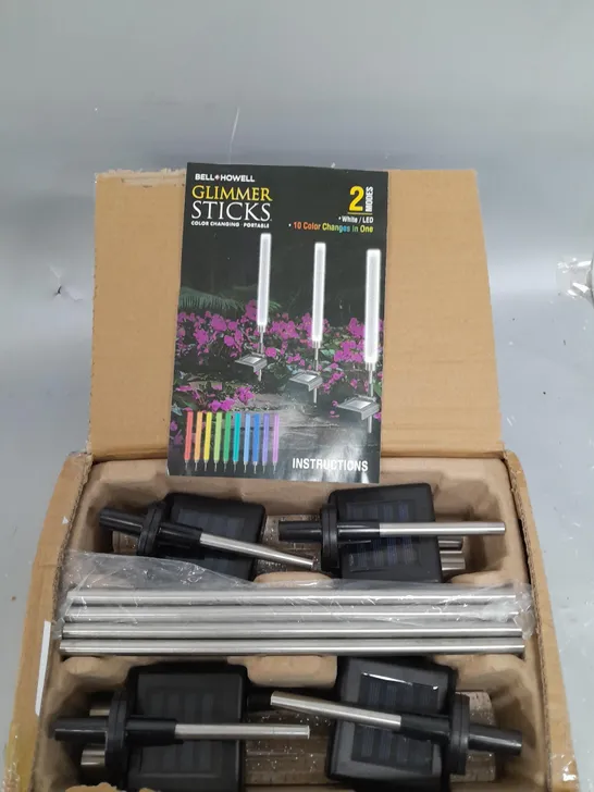 BOXED BELL & HOWELL GLIMMER STICKS SET OF 4 SOLAR PATHWAY LIGHTS