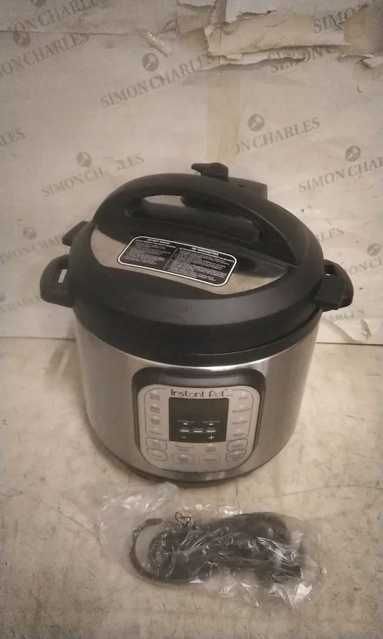 BOXED INSTANT POT  MULTI USE PRESSURE COOKER 