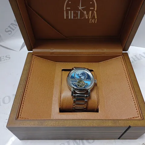 MEN’S HELMA DH AUTOMATIC WORLD VIEW WATCH – TOURBILLON MOVEMENT – BLUE DIAL – STAINLESS STEEL STRAP – GLASS EXHIBITION BACK CASE – LEATHER STRAP INCLUDED