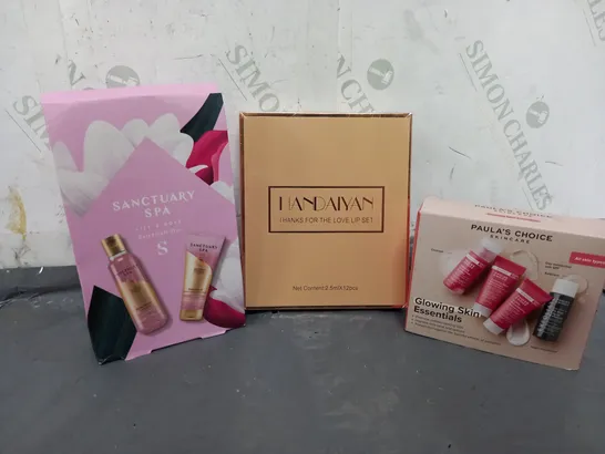 APPROXIMATELY 10 FRAGRANCE AND COSMETIC BOXSETS TO INCLUDE SANCTUARY SPA LILY & ROSE ESSENTIALS DUO, HANDAIYAN THANKS FOR THE LOVE LIP SET, PAULAS CHOICE GLOWING SKIN ESSENTIALS SET, ETC