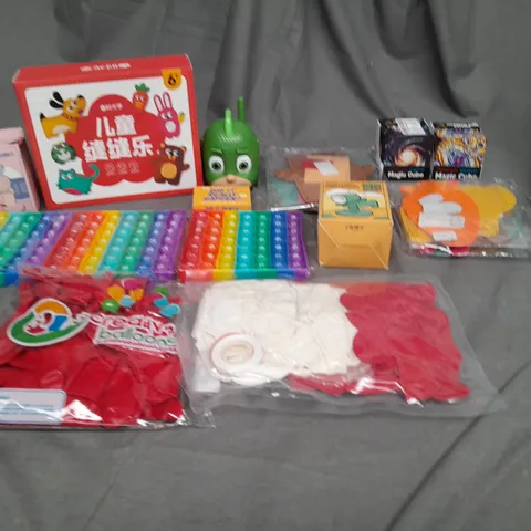 APPROXIMATELY 10 ASSORTED TOYS AND GAMES TO INCLUDE RUBIKS CUBE, POPPET TOY AND BALLOONS