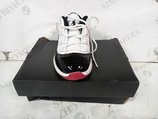 BOXED PAIR OF NIKE AIR JORDAN 11 RETRO LOW IN WHITE/BLACK/RED UK SIZE 9.5C