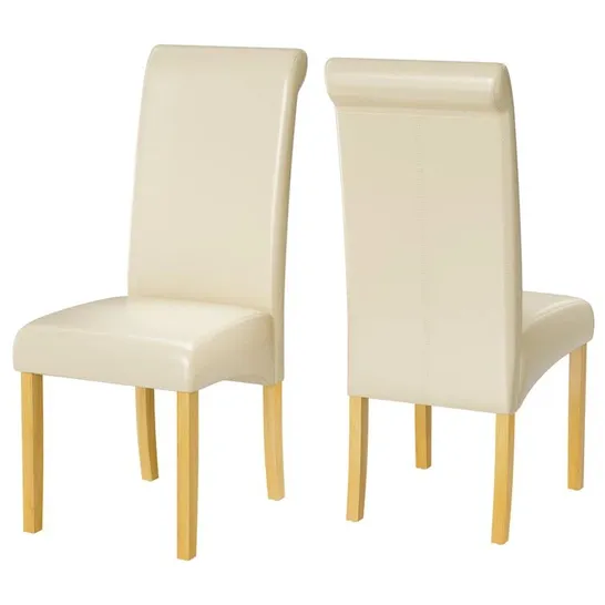 BOXED PAIR OF WHITE FAUX LEATHER UPHOLSTERED BARTLOMIEJ SIDE CHAIRS 