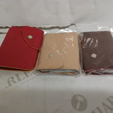 BOX OF ASSORTED LEATHER WALLETS IN BROWN - RED AND BEIGE 