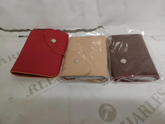 BOX OF ASSORTED LEATHER WALLETS IN BROWN - RED AND BEIGE 