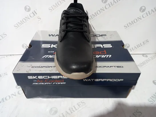 BOXED PAIR OF SKECHERS WATERPROOF SHOES IN BLACK UK SIZE 8