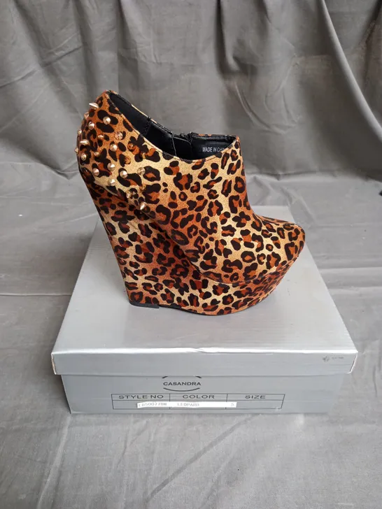 BOX OF 8 PAIRS OF CASSANDRA WEDGE ANKLE BOOTS IN LEOPARD WITH GOLD SPIKES - VARIOUS SIZES