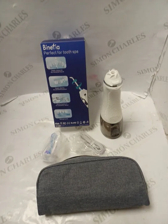 BOXED BINEFIA PORTABLE ORAL IRRIGATOR WITH CARRY CASE, USB CABLE, INSTRCTIONS AND ACCESSORIES