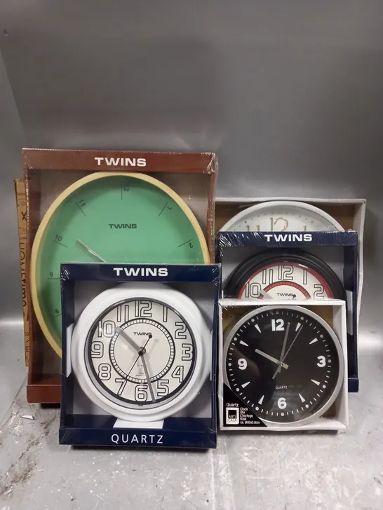 BOX OF APPROXIMATELY 12 ASSORTED SEALED WALL CLOCKS