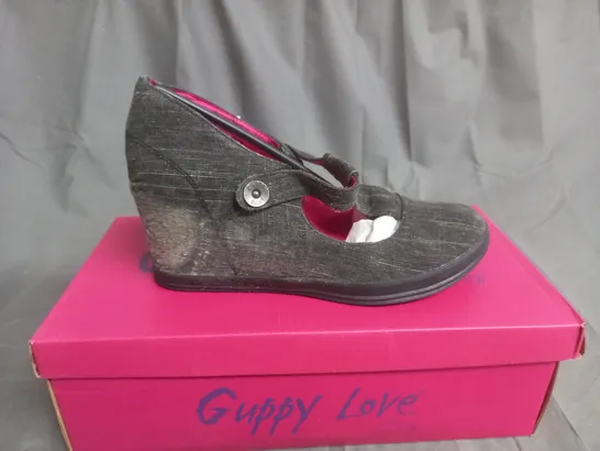 BOX OF APPROXIMATELY 12 BLACK  GUPPY LOVE BY BLOWFISH SHOES IN VARIOUS SIZES 