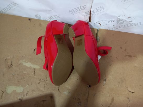 PAIR OF PIN UP COUTURE RED SHOES SIZE 7