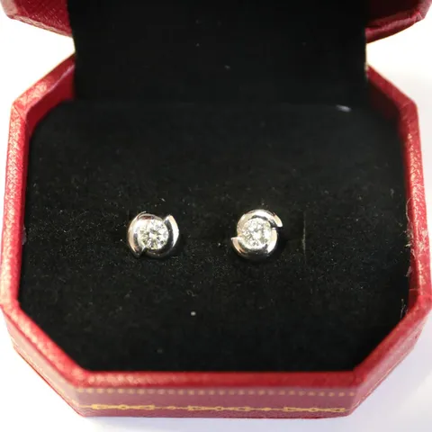 DESIGNER 18CT WHITE GOLD STUD EARRINGS SET WITH DIAMONDS WEIGHING +0.52CT