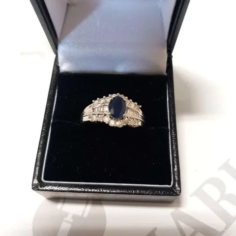 9CT WHITE GOLD DRESS RING, SET WITH A NATURAL SAPPHIRE AND DIAMONDS WEIGHING +1.30CT