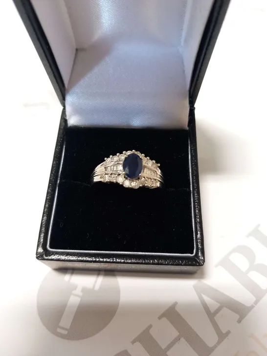 9CT WHITE GOLD DRESS RING, SET WITH A NATURAL SAPPHIRE AND DIAMONDS WEIGHING +1.30CT