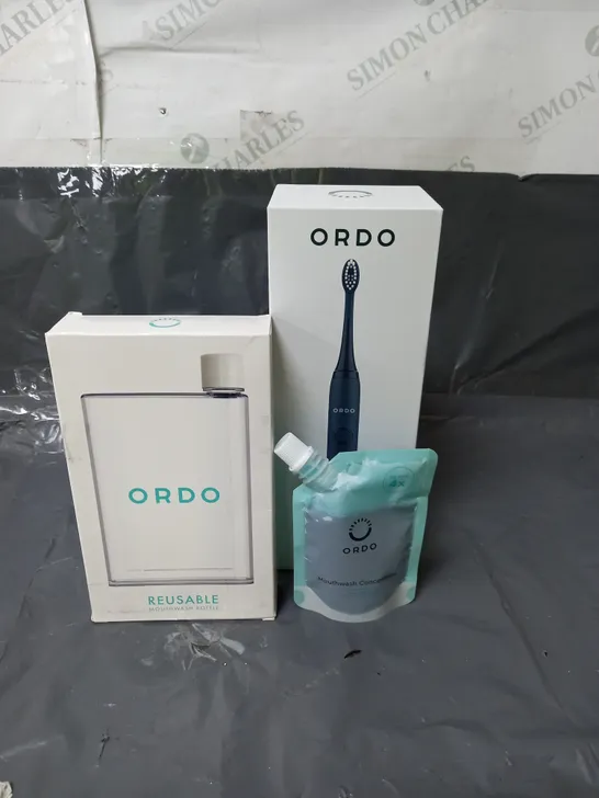 ORDO SONIC ELECTRIC TOOTHBRUSH WITH A REUSABLE MOUTHWASH BOTTLE AND MOUTHWASH CONCENTRATE