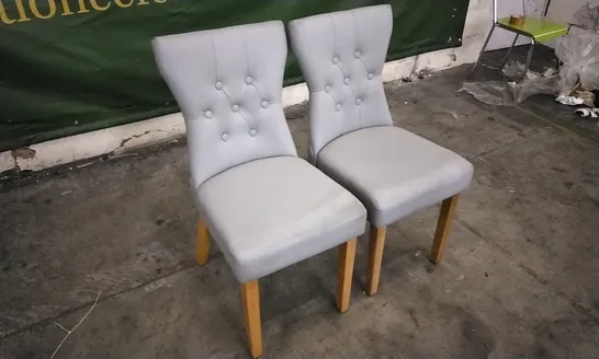 PAIR OF BEWLEY LIGHT GREY LEATHER BUTTON BACK DINING CHAIRS WITH OAK LEGS