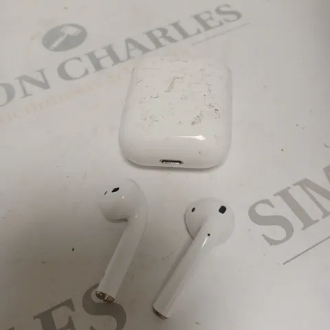 APPLE AIRPODS IN WHITE WITH CHARGING CASE 