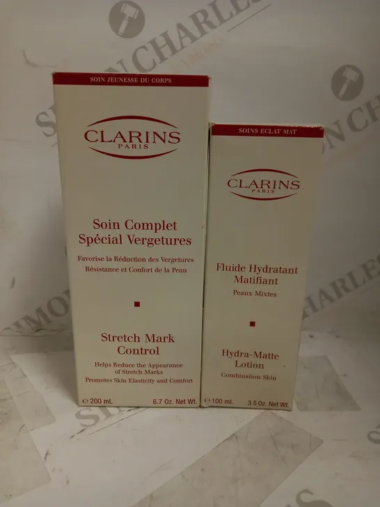 LOT OF 2 ASSORTED CLARINS PRODUCTS TO INCLUDE STRETCH MARK CONTROL 200ML & HYDRA-MATTE LOTION 100ML