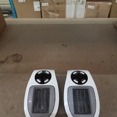 BOXED WARM HOME HEATING 2X 500W PLUG IN HEATERS