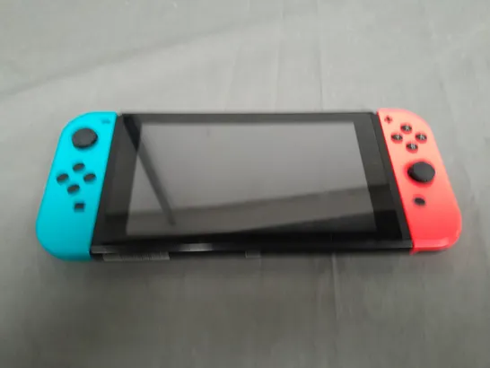 NINTENDO SWITCH AND CHARGING DOCK