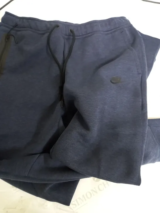 NIKE TECH FLEECE NAVY PANTS - LARGE