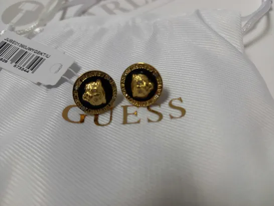 BOX OF 2 GUESS ITEMS TO INCLUDE HEART TO HEART LADIES HOOP EARRINGS AND DAKTARI LION SUD EARRINGS RRP £98