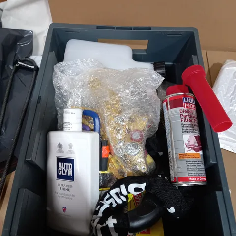 TOTE OF ASSORTED AUTO MEALS TO INCLUDE A AUTO GLYM ULTRA DEEP SHINE, A 5 DIGIT BIKE LOCK AND A DIESEL PARTICULATE FILTER PROTECTOR