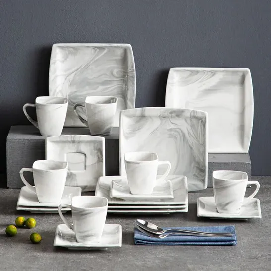 BOXED JALIYIAH 18 PIECE DINNERWARE SET. SERVICE FOR 6. COLOUR: GREY