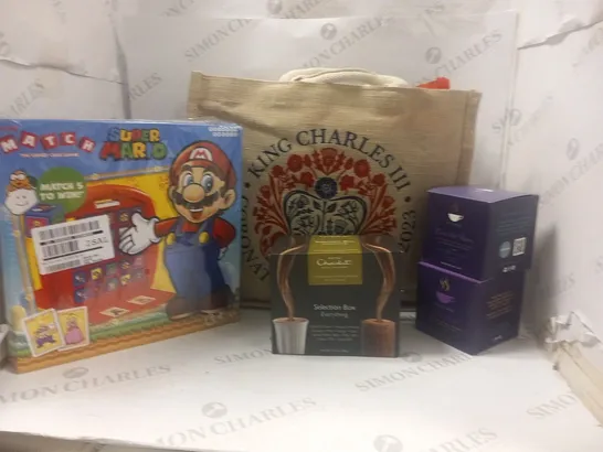 APPROXIMATELY 4 ASSORTED PRODUCTS TO INCLUDE; KING CHARLES CORONATION HAMPER, HOTEL CHOCLAT SELECTION BOX, SUPER MARIO THE CRAZY CUBE GAME AND HOTTEA MAMA HERBAL TEA