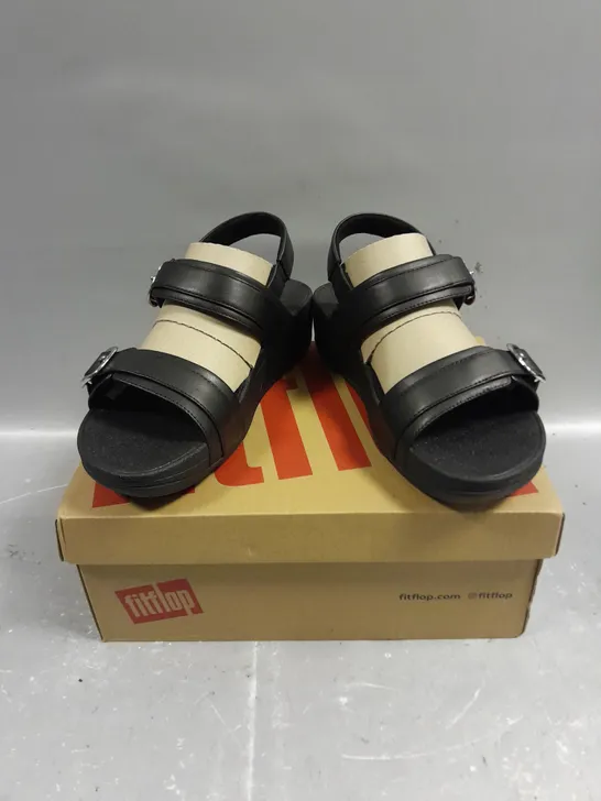 BOXED PAIR OF FITFLOP LULU ADJUSTABLE LEATHER BLACK-STRAP SANDALS - 4.5