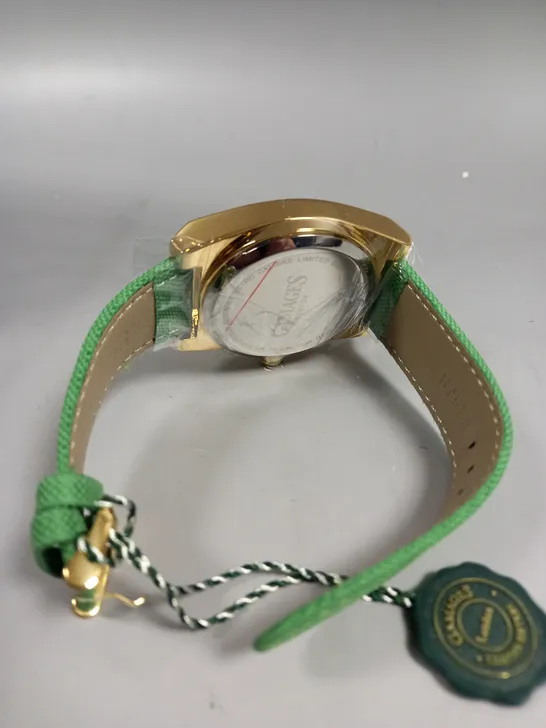 BOXED GAMAGES RETRO CALIBRE GOLD/GREEN WATCH