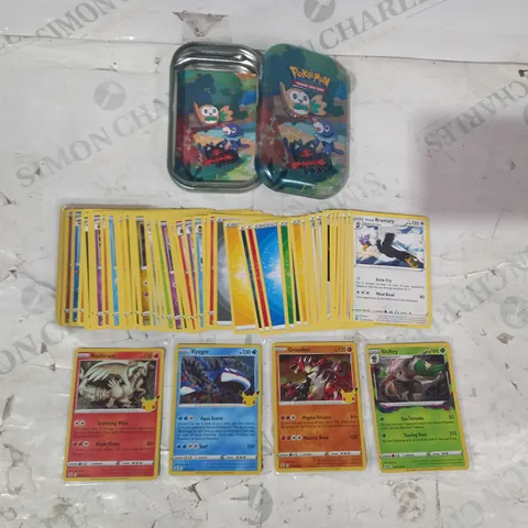 lot of assorted POKÉMON TRADING CARDS W. TIN