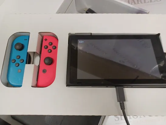 BOXED NINTENDO SWITCH WITH CONTROLLERS AND ACCESSORIES