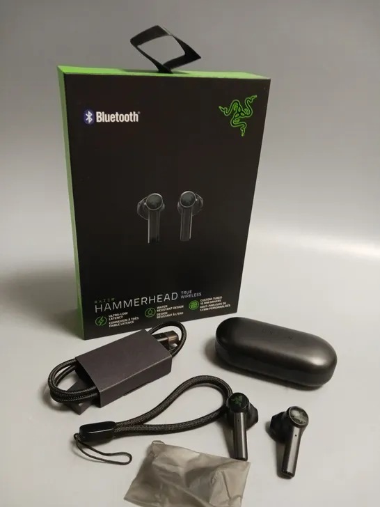 BOXED RAZER HAMMERHEAD WIRELESS HEADPHONES IN BLACK AND GREEN INCLUDES CHARGING CASE, CABLE, WRIST STRAP AND SPARE BUDS