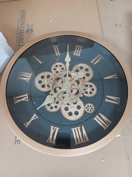 LARGE VINTAGE TURNING GEARS WALL CLOCK WITH LARGE ROMAN NUMERALS