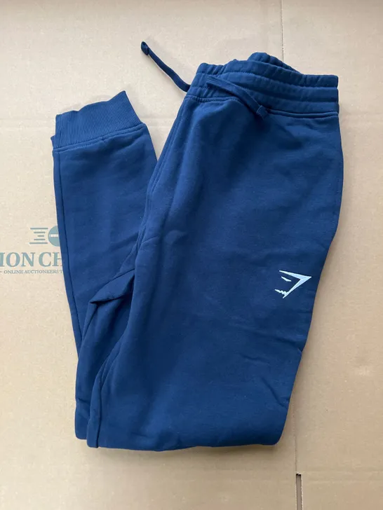 GYMSHARK CREST JOGGERS IN NAVY BLUE SIZE MEDIUM