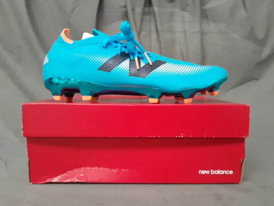 BOXED PAIR OF NEW BALANCE FURON FOOTBALL BOOTS IN SKY BLUE/ORANGE UK SIZE 10.5