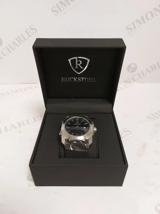 MEN’S RUCKSTUHL R180 WATCH – DATE FUNCTION – BLACK DIAL – CURVED SCRATCH RESISTANT CRYSTAL GLASS – RUBBER STRAP 