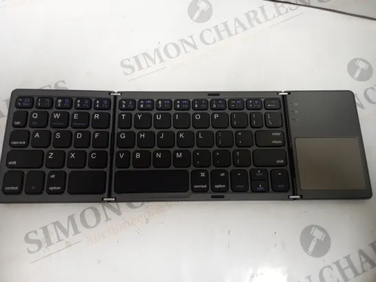 FOLDABLE WIRELESS BLUETOOTH KEYBOARD WITH MOUSE PAD