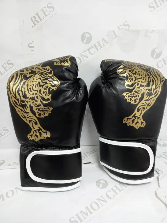 PAIR OF BLACK BOXING GLOVES WITH GOLD DETAIL 
