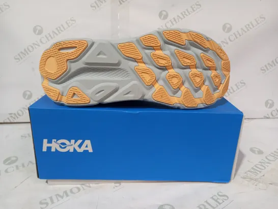 BOXED PAIR OF HOKA TRAINERS IN LIGHT BLUE UK SIZE 8