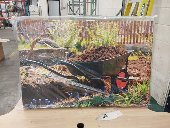 BAGGED WHEELBARROW IN A GARDEN PAINTING BY NOBILIOR (1 BOX)