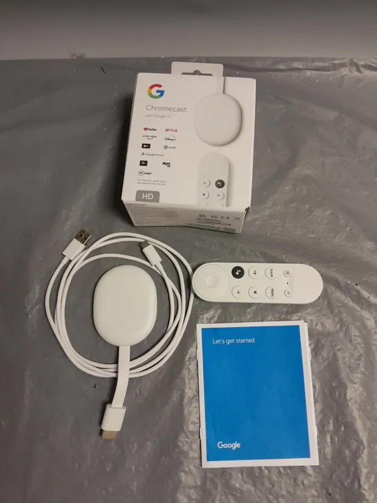 BOXED GOOGLE TV CHROMECAST IN WHITE