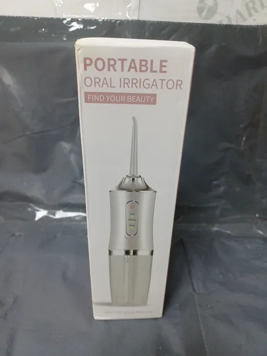 SEALED PORTABLE ORAL IRRIGATOR