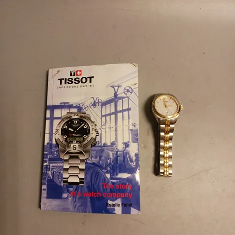 TISSOT WATCH IN GOLD AND SILVER INCLUDES BOOK THE STORY OF A WATCH COMPANY BY ESTELLER FALLET