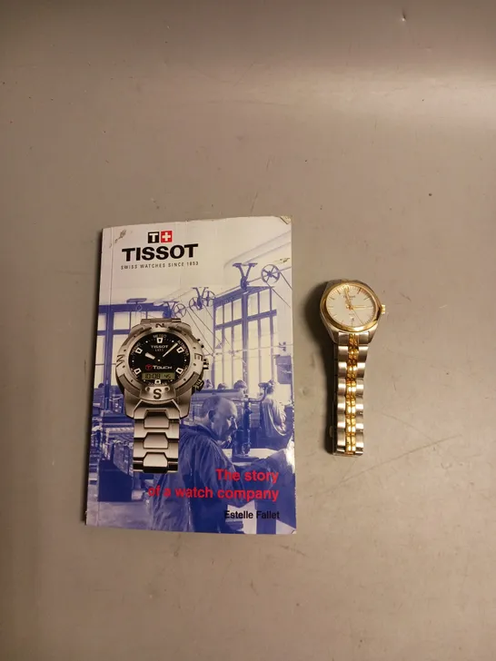 TISSOT WATCH IN GOLD AND SILVER INCLUDES BOOK THE STORY OF A WATCH COMPANY BY ESTELLER FALLET