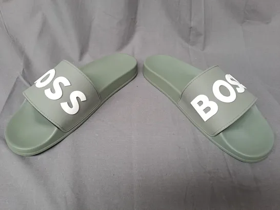 PAIR OF BOSS SLIDERS IN OLIVE GREEN EU SIZE 43